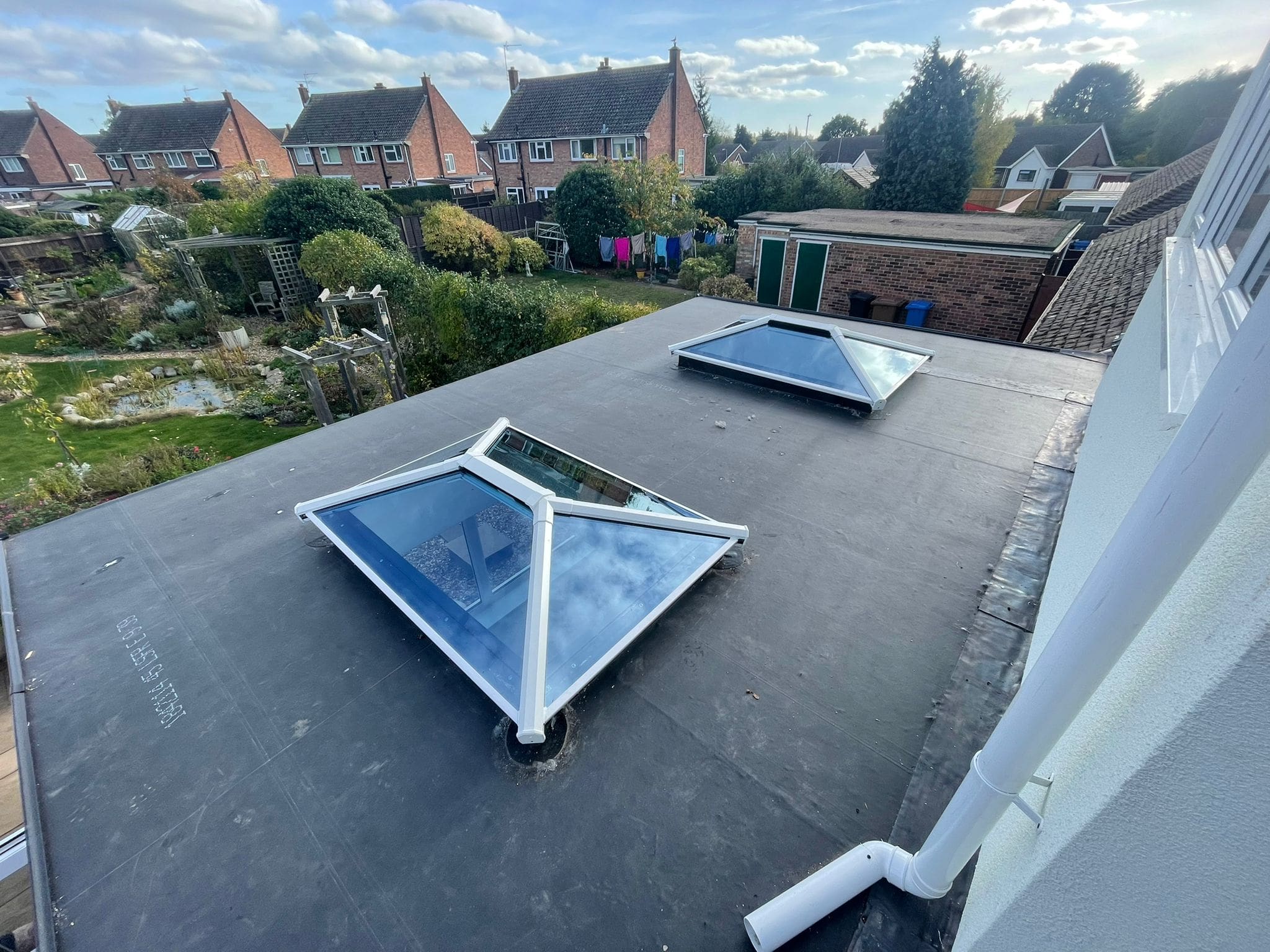 Roof lantern installed in a new flat EPDM rubber roof