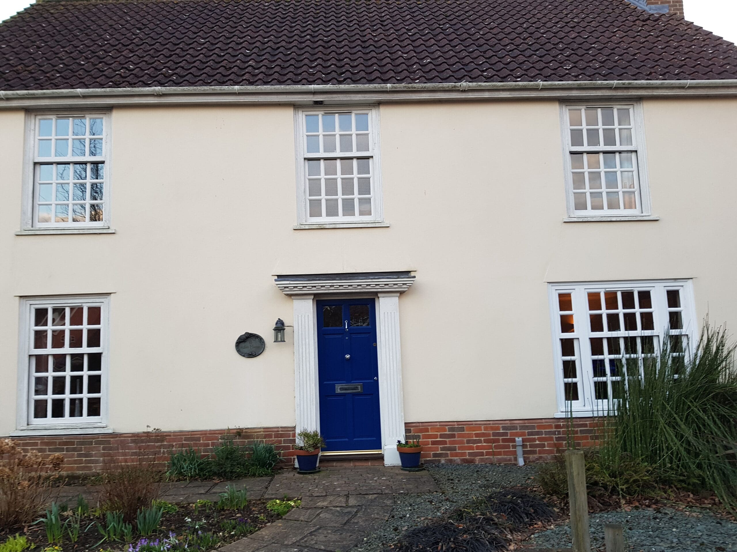 UPVC Vertical Sliding Windows showcasing different styles